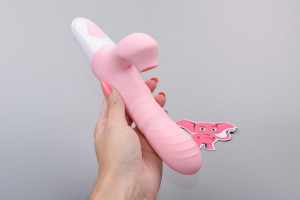 Adore Motio II. vibrator cu presiune, în mână